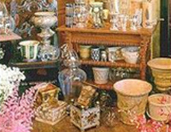 Collection of containers, vases, urns, cachepots, silverplate, and more
